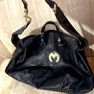 Large black leather purse w/ gold metal M embellishment